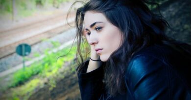 A woman waiting for a man to call